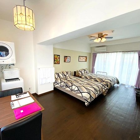 Hotel Houklea Nago Bagian luar foto