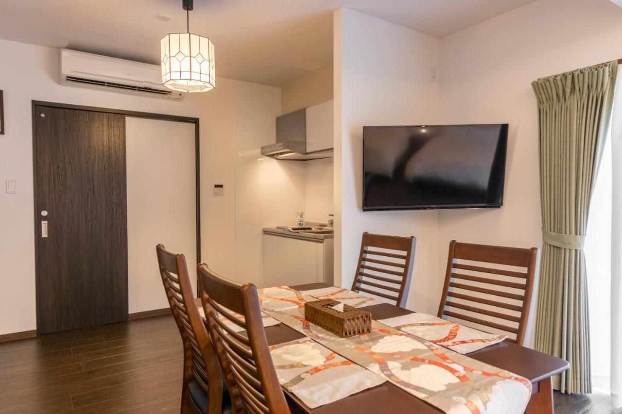 Hotel Houklea Nago Bagian luar foto