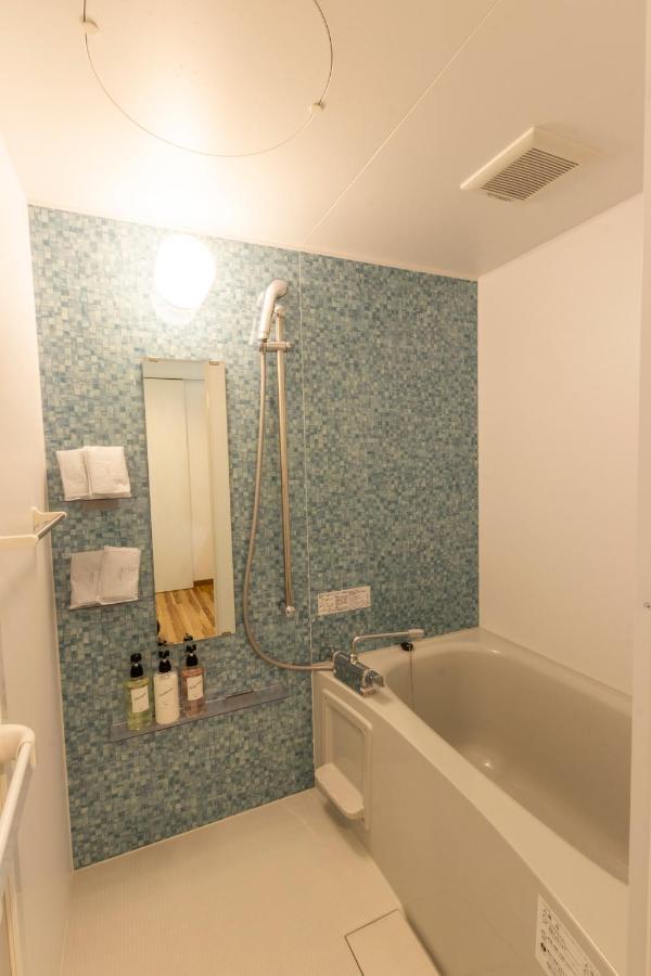 Hotel Houklea Nago Bagian luar foto