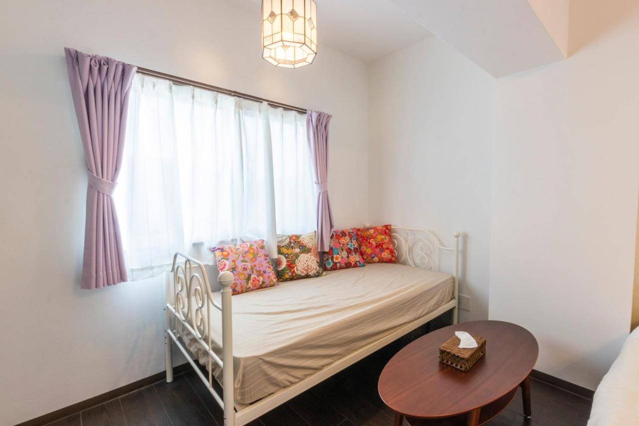 Hotel Houklea Nago Bagian luar foto